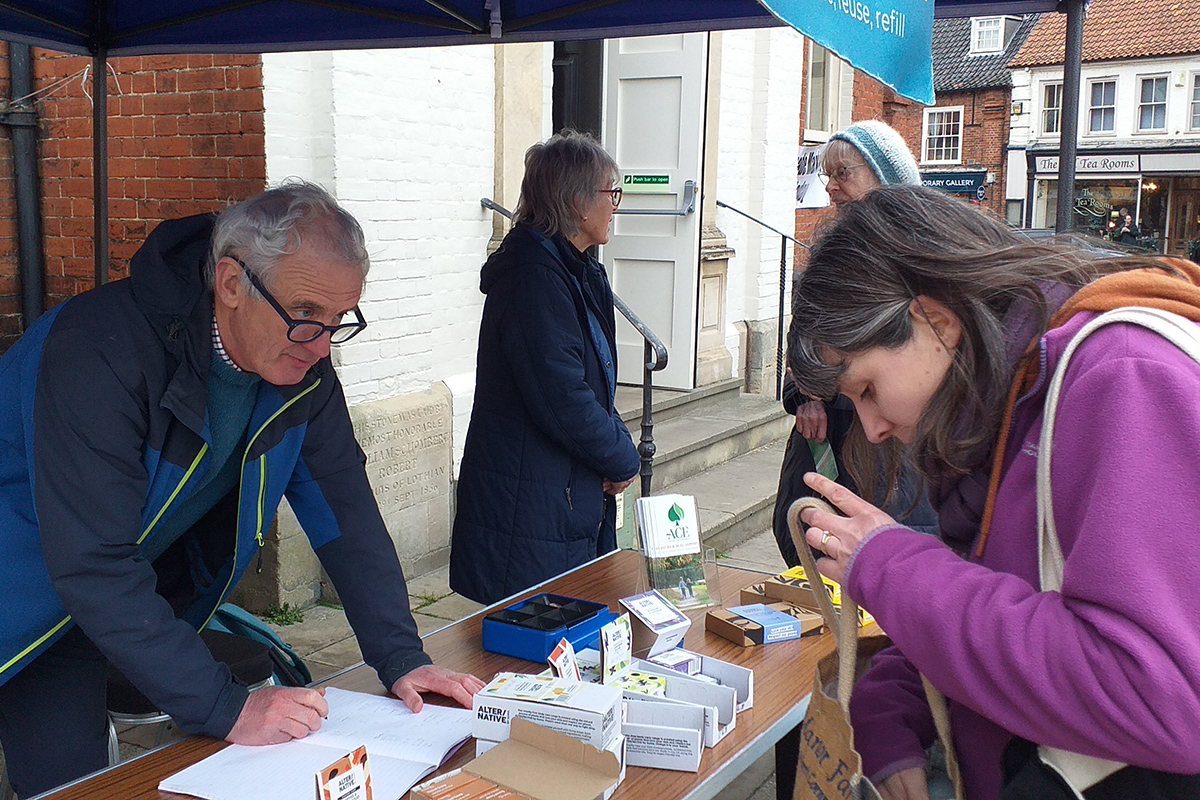 Mike Goodwin at the Quakers refill stall in Aylsham Farmers' Market.